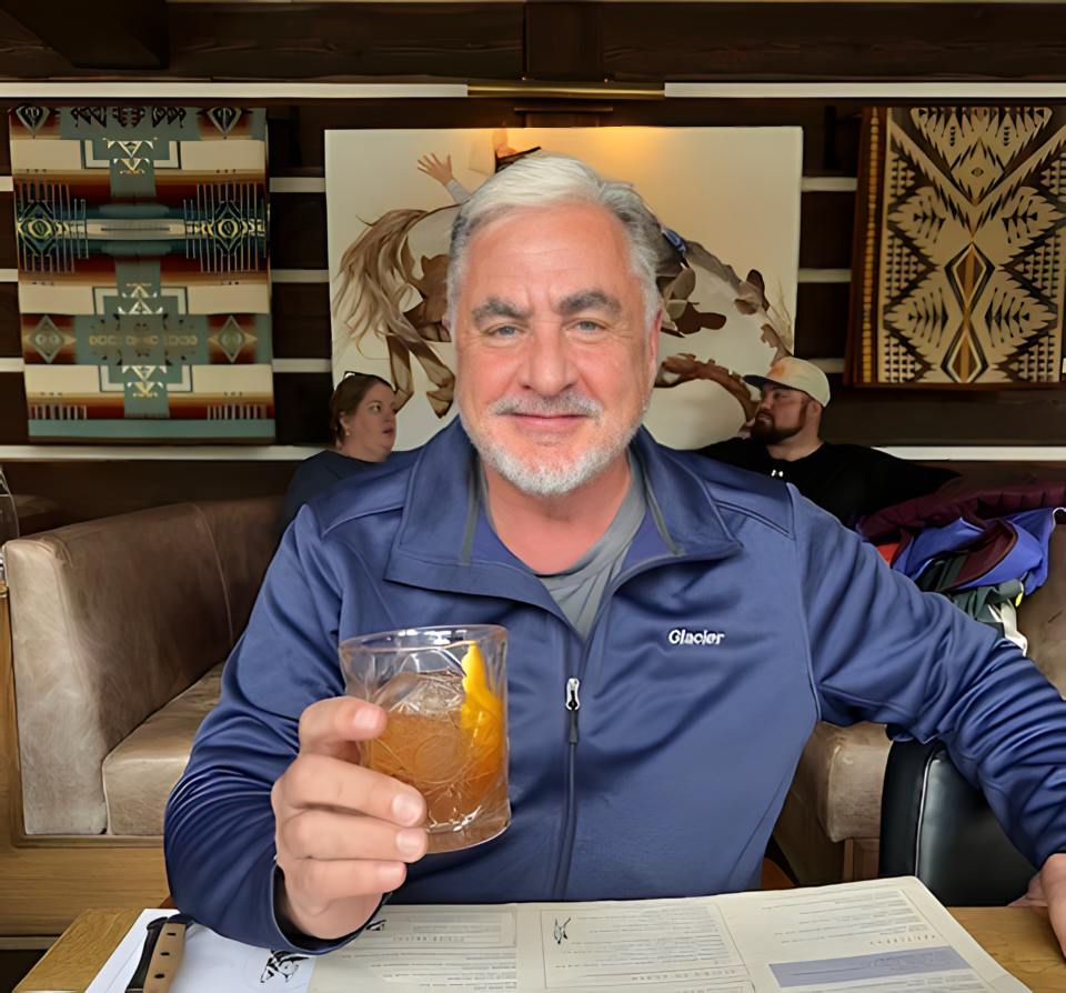 Chuck Swaney having an Old Fashioned at Chuck's Steakhouse in Banff, Alberta CA