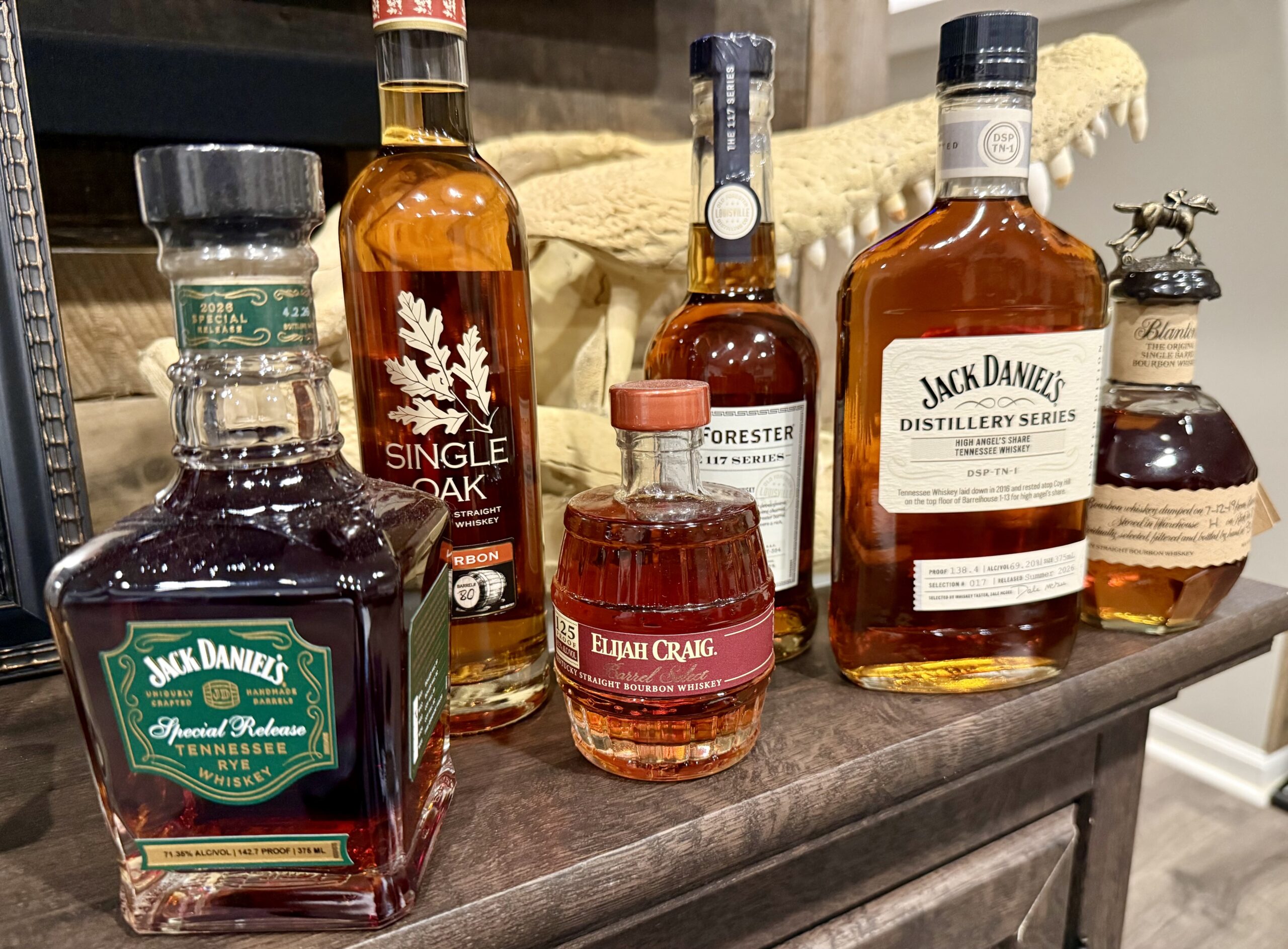a line up of whiskey bottles in 375 ml size